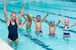 © WavebreakMediaMicro - Female instructor with children enjoying in swimming pool