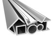 Shiny rolled metal steel products on white