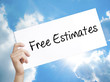 Free Estimates Sign on white paper. Man Hand Holding Paper with text. Isolated on sky background