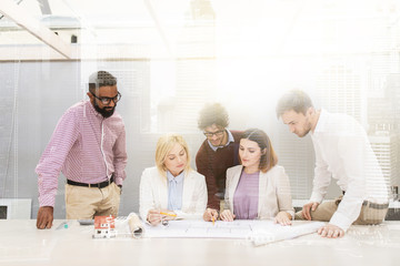 Sticker - business team discussing house project at office