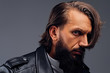 © Fxquadro - Close up portrait of bearded male with long hair.