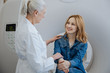 © zinkevych - Happy delighted woman interacting with her doctor
