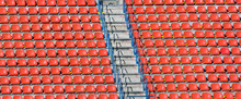 Empty Red Seats In A Stadium