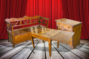 Wall Mural - Ladies and gentlemen here is to you the old furniture just restored! - concept image with an old italian furniture on stage