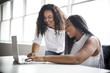 © Louis-Paul Photo - Two teen at desk in her office with laptop