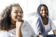 © Louis-Paul Photo - affectionate friends afro american sitting on sofa