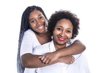 mother and her teenage daughter isolated on white
