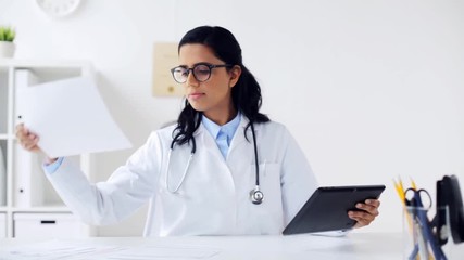 Sticker - doctor with tablet pc and papers at hospital