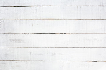 Wall Mural - Old wooden planks painted with white paint cracked by a rustic background