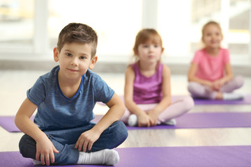 Wall Mural - Group of children doing gymnastic exercises