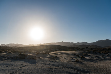 sunset over sand dunes