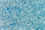 Fototapeta Sypialnia - Shining water in pool