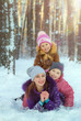 © kamaz007 - Children play with mom in winter. Two daughters and mom