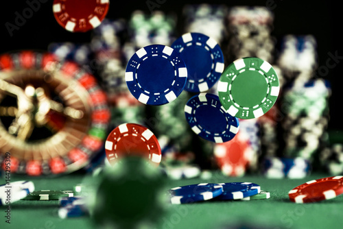 фотография Casino Concept background with dice, roulette and chips