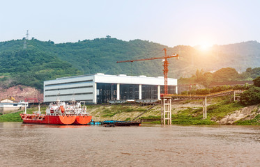 Wall Mural - Small shipyard on the river