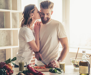 Wall Mural - Couple cooking healthy food