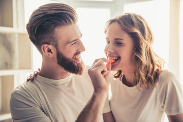 Canvas Print - Couple cooking healthy food