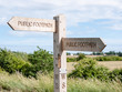 © Nigel Burley - Public footpath sign in the UK giving directions of the path.
