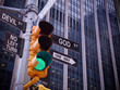 NYC Wall street yellow traffic green light black pointer guide One way to GOD. No way, no turn to devil. Right are pious efforts, right way to GOD. GOD need your good deeds. Religion