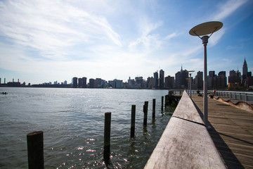 Wall Mural - Pier and buildings in Manhattan in the shade, New York