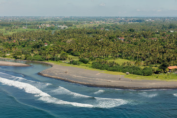 The view from the glider on the ocean shore in sunny weather - Bali, Indonesia