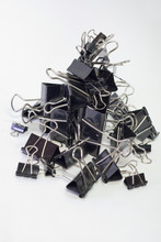 Metal Binder Clips For Paper. Blacks, Different Sizes. Vertical Hill