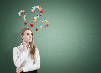 Wall Mural - Pensive woman and paper ball questions