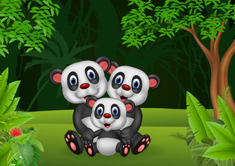 Canvas Print - Cartoon panda family in the jungle