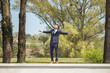 © HD92 - young man, looking up above, arms outstreched