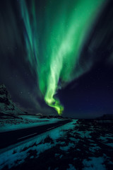 amazing multicolored green aurora borealis also know as northern lights in the night sky over lofote