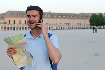 Wall Mural - Tourist holding map and calling by phone