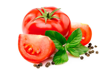 Wall Mural - Tomatoes, basil leaves and black pepper on white.