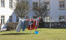 Domestic Chores, Colorful Laundry Drying In Sunlight In A Winding Morning