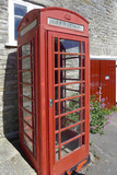 Fototapeta Londyn - red old telephone box in England Cornwall
