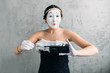 © Nomad_Soul - Mime female artist performing with mobile phone