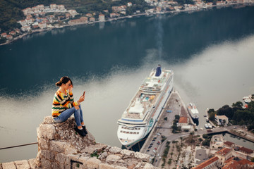 woman using smartphone app and travel