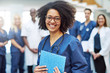© Flamingo Images - Cheerful African American medical worker in hospital