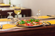 Good pizza with cherry tomato and white wine
