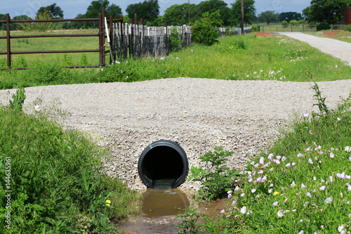 Fotografia, Obraz Drainage pipe: New culvert under small country side gravel road