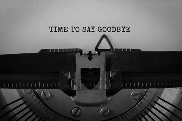 Poster - text time to say goodbye typed on retro typewriter