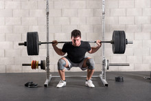 Man Doing A Crossfit Back Squat Exercise