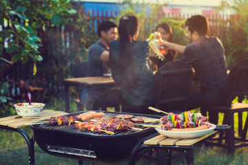 Dinner party, barbecue and roast pork at night