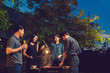 © torwaiphoto - Dinner party, barbecue and roast pork at night