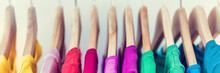 Banner Horizontal Crop For Text Background Of Clothing Rack. Clothes For Women Hanging On Hangers In Home Closet Or Shopping Mall For Store Sale Concept. Colorful Selection Of T-shirts.
