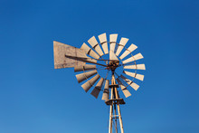 Close-up Of A Windmil And Blue Sky
