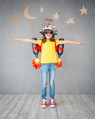 Canvas Print - Kid playing with jet pack at home