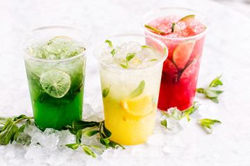 Fruit summer drinks with ice