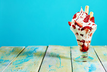 Vanilla And Strawberry Ice Cream Sundae