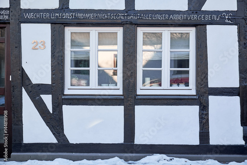 Two White Colonial Style Windows In A And Black Painted Two White Colonial Style Windows In A And Black Painted Timbered House Winterberg