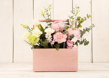 Pink Wooden Box With Flowers Roses And Carnations In Girl's Hands